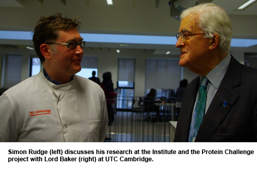 Simon Rudge discusses his research at the Institute and the Protein Challenge project with Lord Baker.